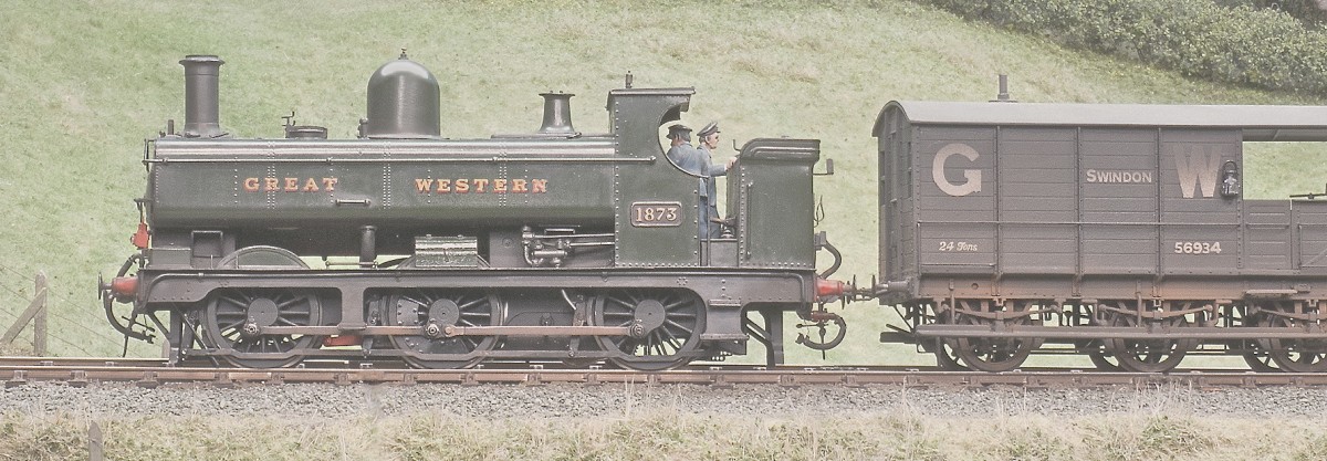 Part of the heading picture from the January Railway Modeller feature. An 1890 Dean Pannier tank No 1873 and a six wheeled brake van head west on the down main.