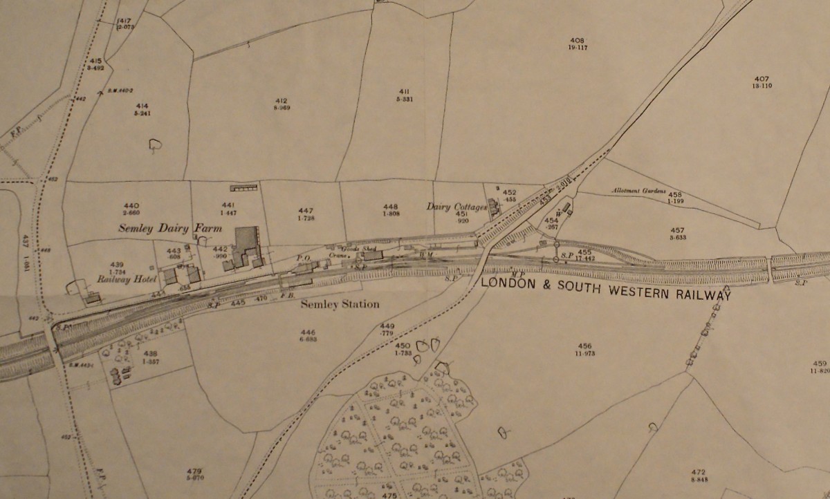 This 1901 OS map of Semley shows the quite easy field boundaries looking north over the station and dairy. The fields are numbered, and those are pigsties and a little food store for waste at the other end of field 441, just a little bit away from the other buildings!